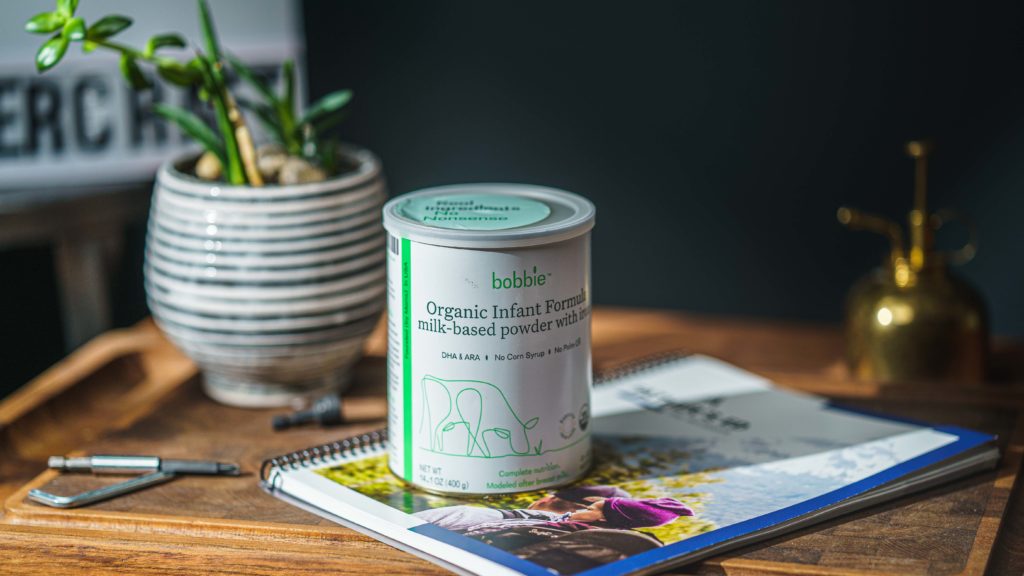 A can of Bobbie formula on a table